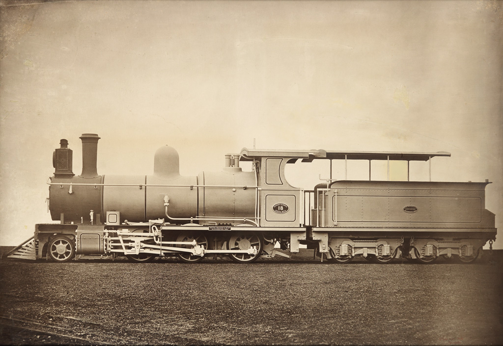JAMES MUDD (1821-1906) An oversized and richly printed photograph of a steam train engine.